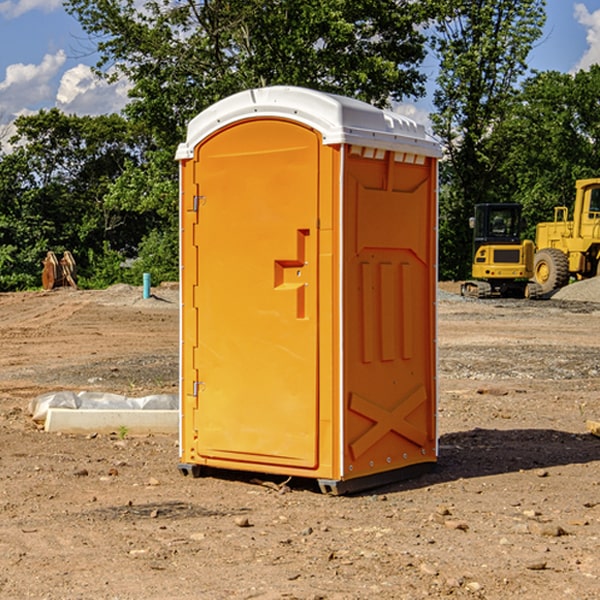 how often are the porta potties cleaned and serviced during a rental period in Randolph